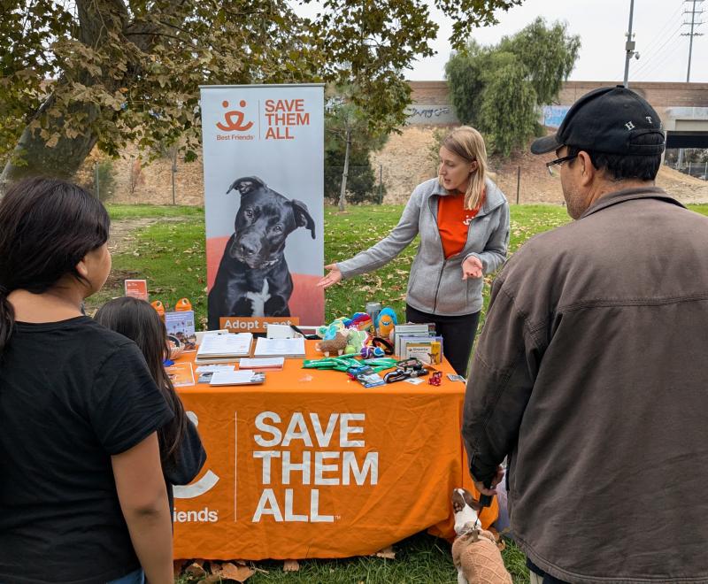Volunteer tabling to represent Best Friends